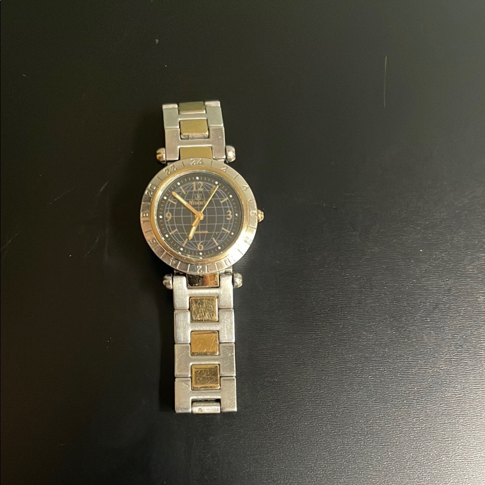 Nivada women’s Silver and Gold Watch
